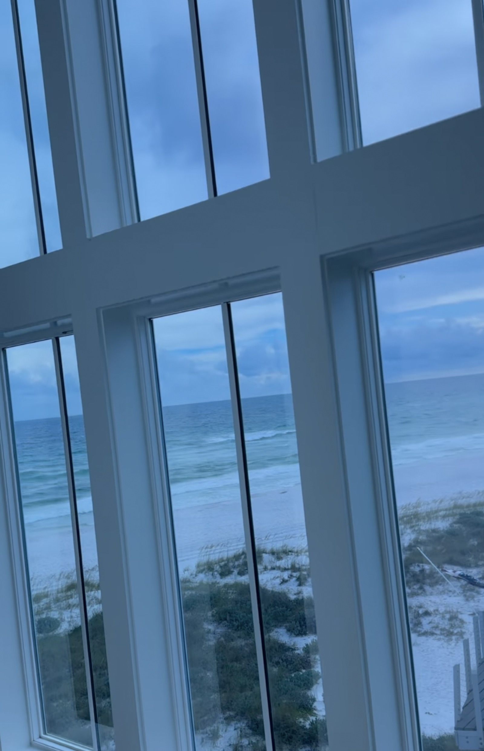 Floor-to-ceiling Gulf-view windows with solar film near Grayton Beach, FL