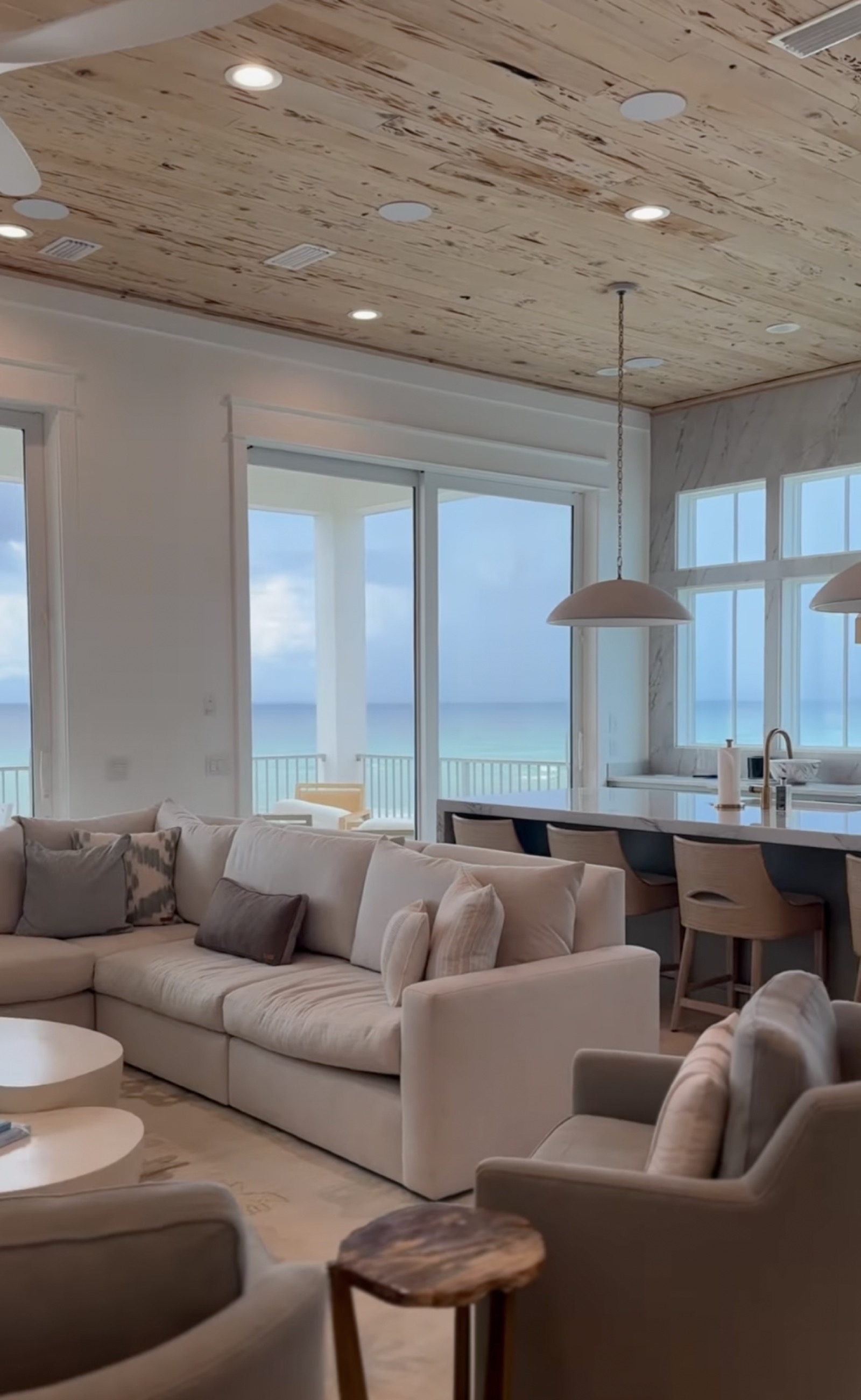 Living room with Gulf-view tinted windows in Santa Rosa Beach, FL