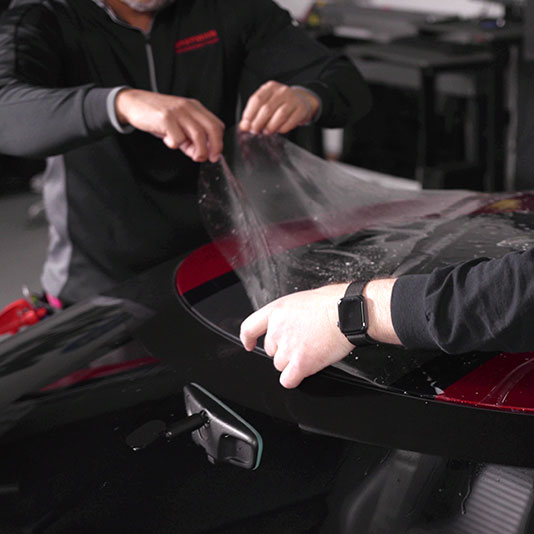 Paint protection film on an EV front end