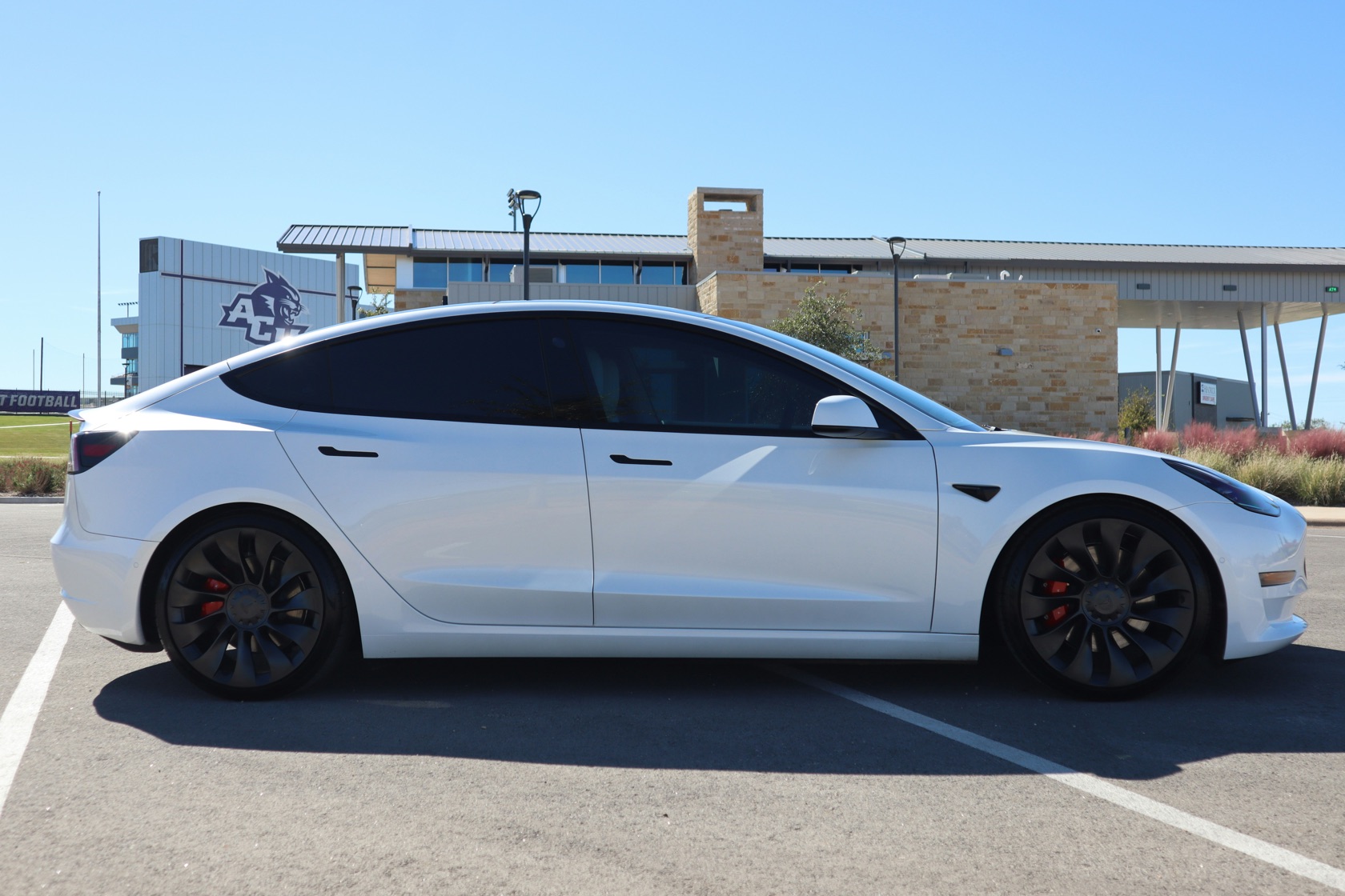 White Tesla Model 3 with ceramic window tint in Panama City Beach, FL