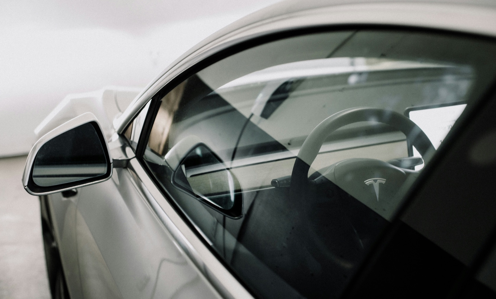 Close-up of ceramic window tint on a Tesla in Panama City Beach, FL